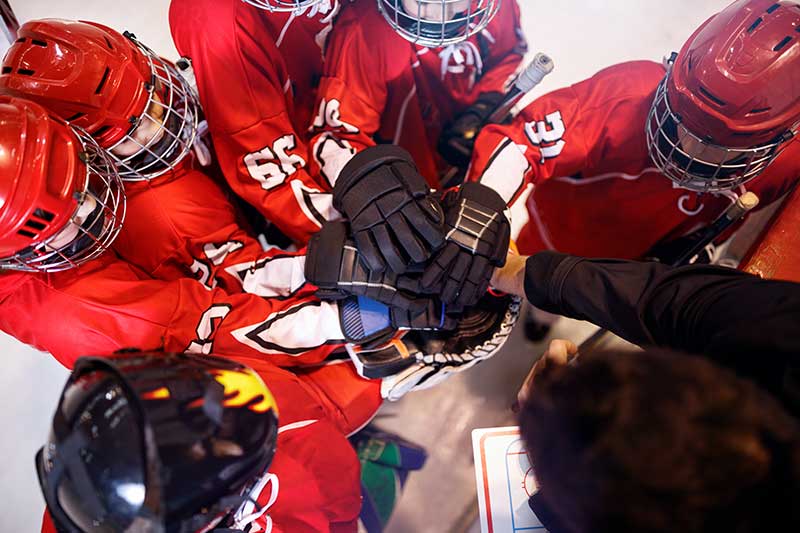 Hockey team in a huddle