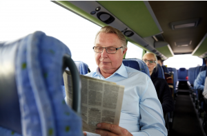 Coach bus rider