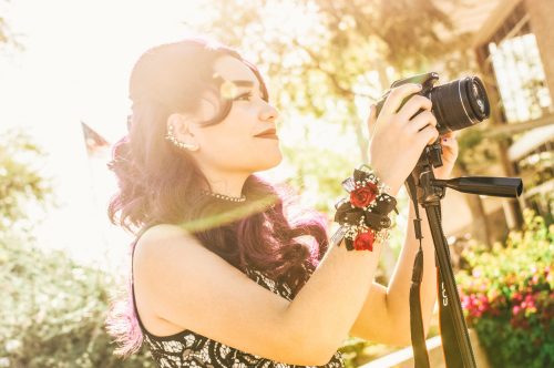 young-woman-taking-prom-photos
